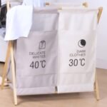 Panier à linge double grilles avec support en bois pratique